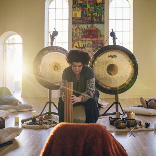 Leisa giving a gong session.